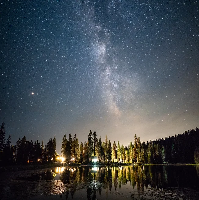 A view of the night sky over the lake